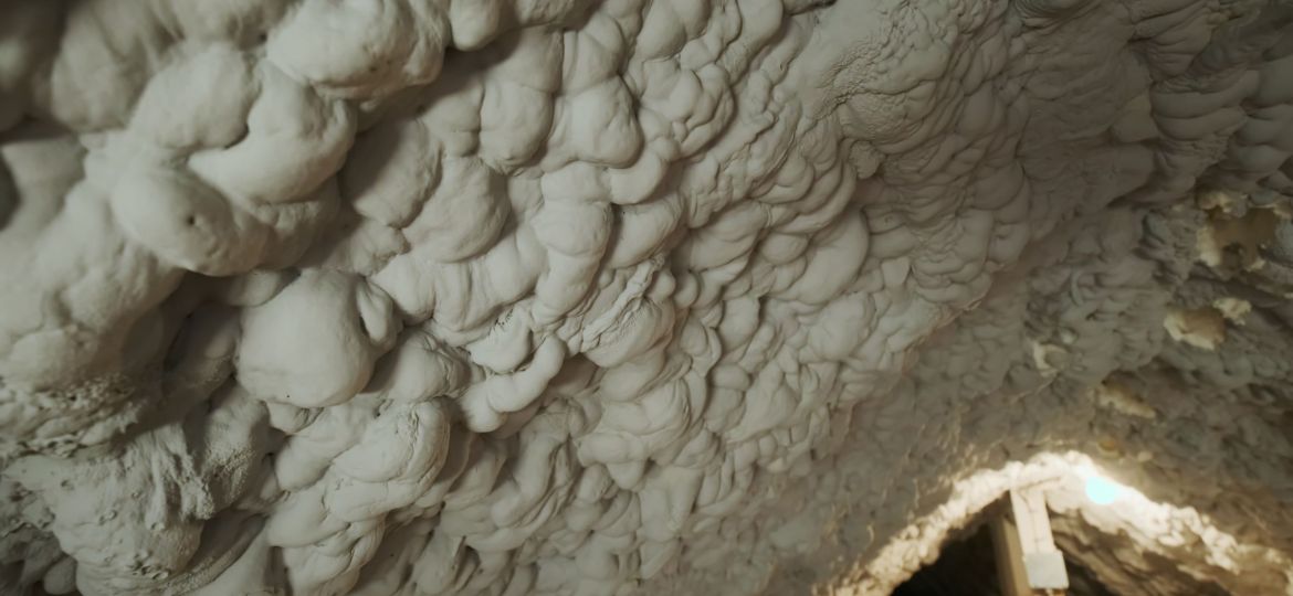 thermal-insulation-installing-at-the-attic-the-roof-close-up-view-SBI-351369671