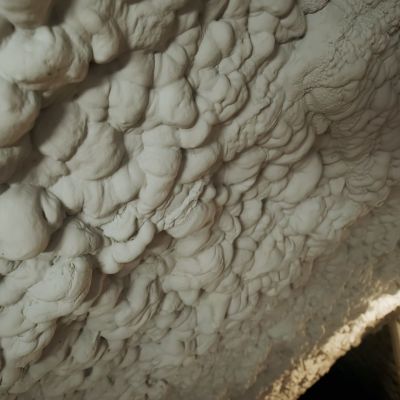 thermal-insulation-installing-at-the-attic-the-roof-close-up-view-SBI-351369671